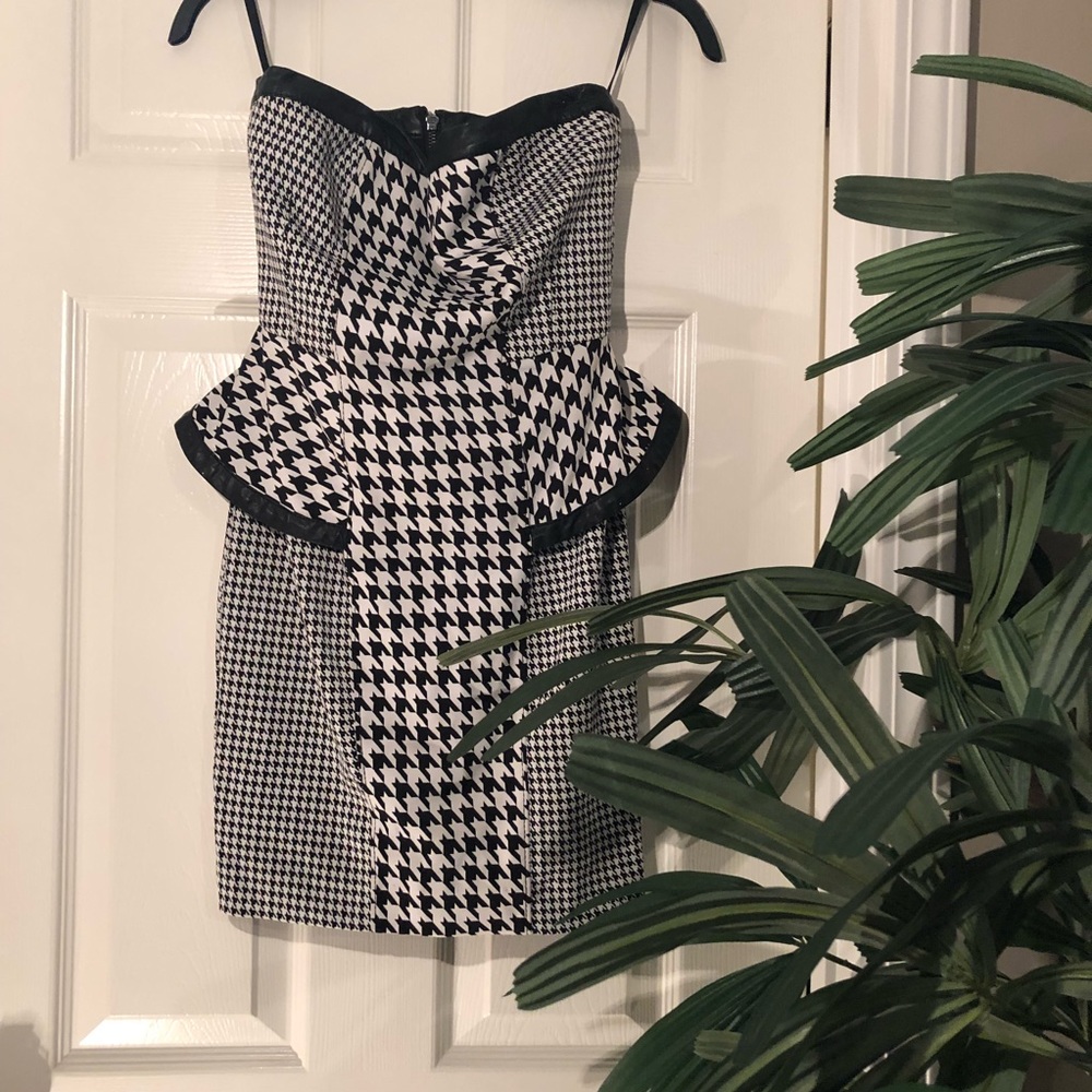 Peplum houndstooth leather trimmed dress